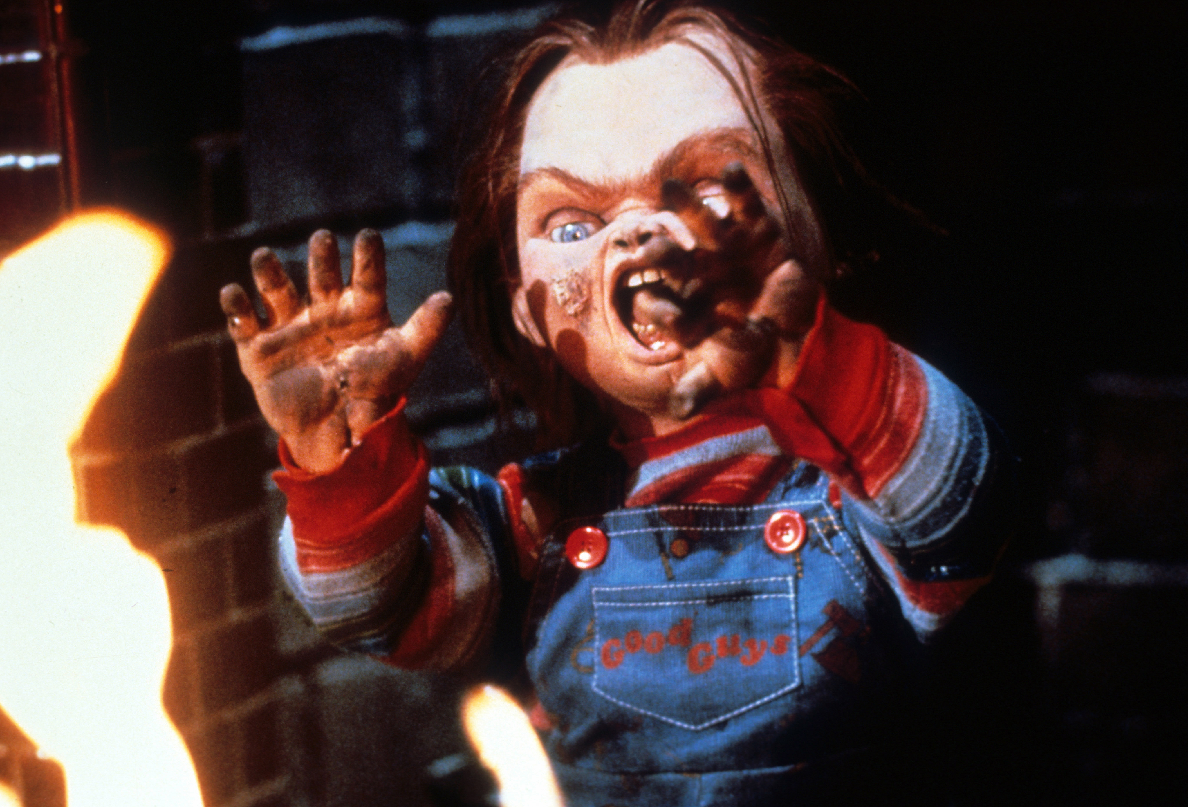 Chucky Near Flames In 'Child's Play'