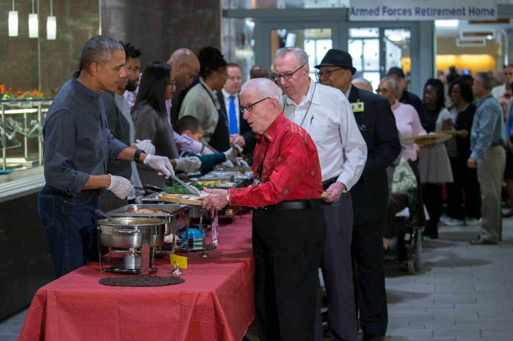 US President Barack Obama Serves Dinner At The Armed Forces Retirement Home