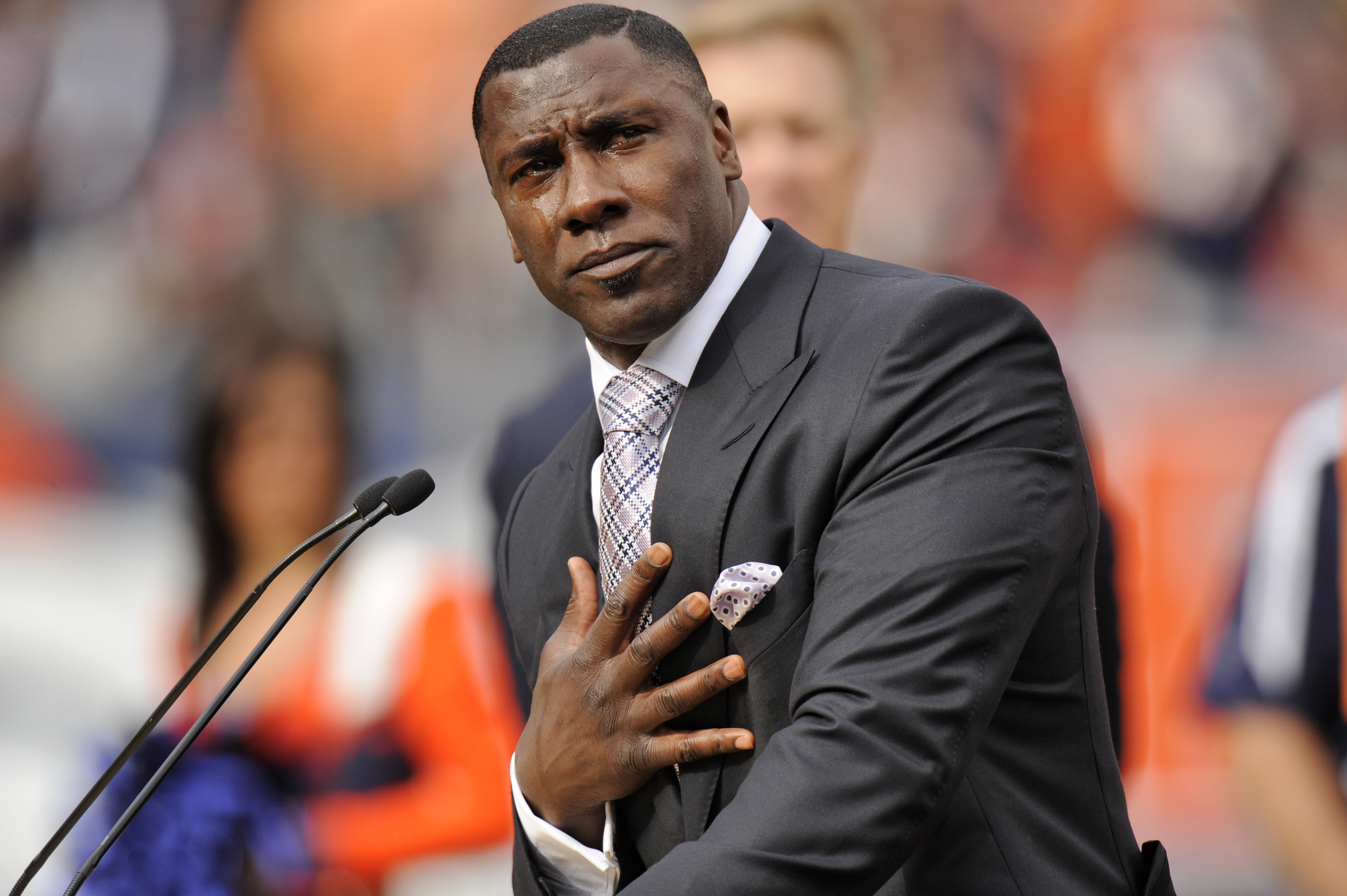 Bronco great Shannon Sharpe is honored by being put in the ring of fame during half time of the Bronco's game vs the Cleveland Browns at Invesco Field at Mile High Sunday September 20, 2009. JOE AMON/THE DENVER POST