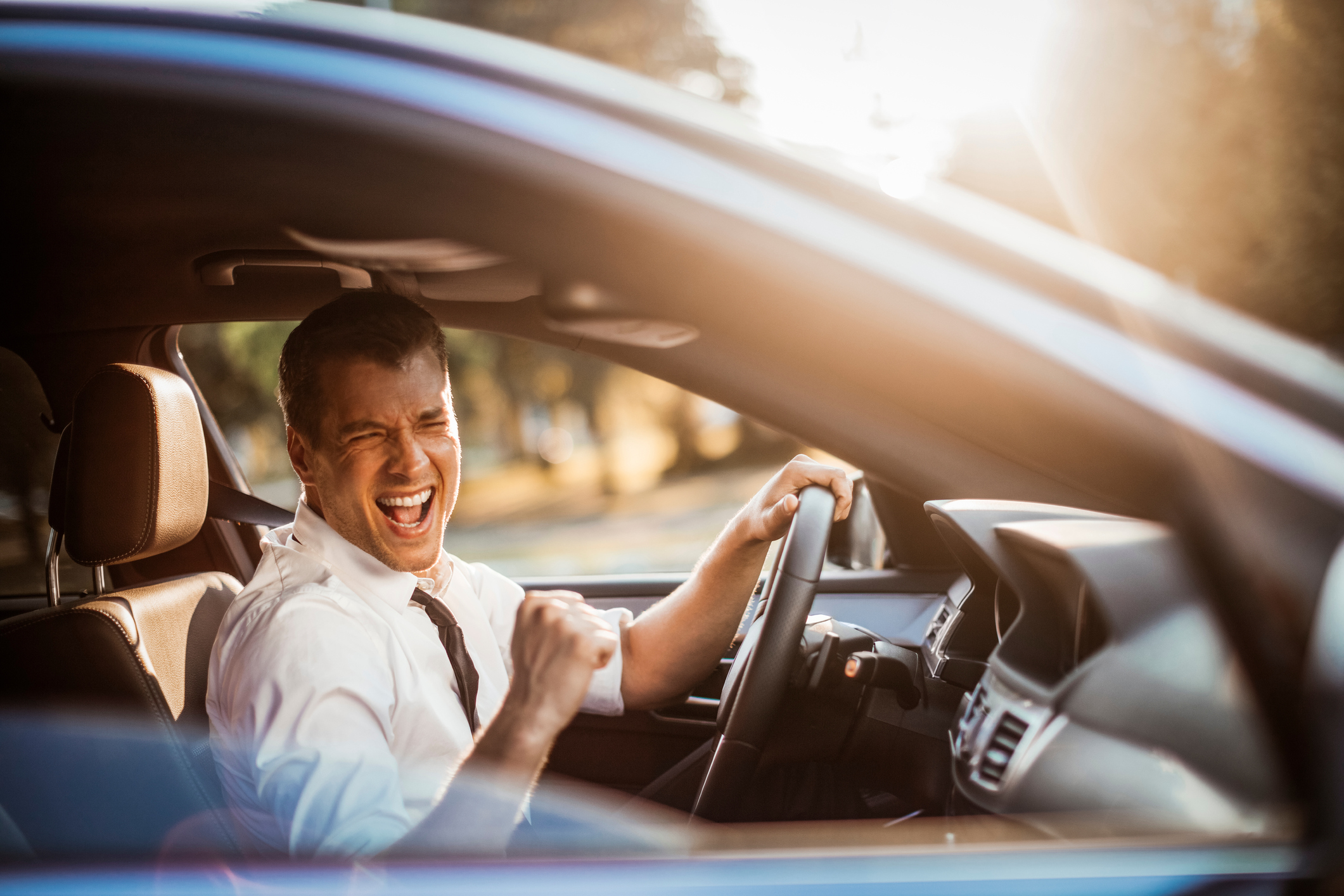 Businessman driving a car