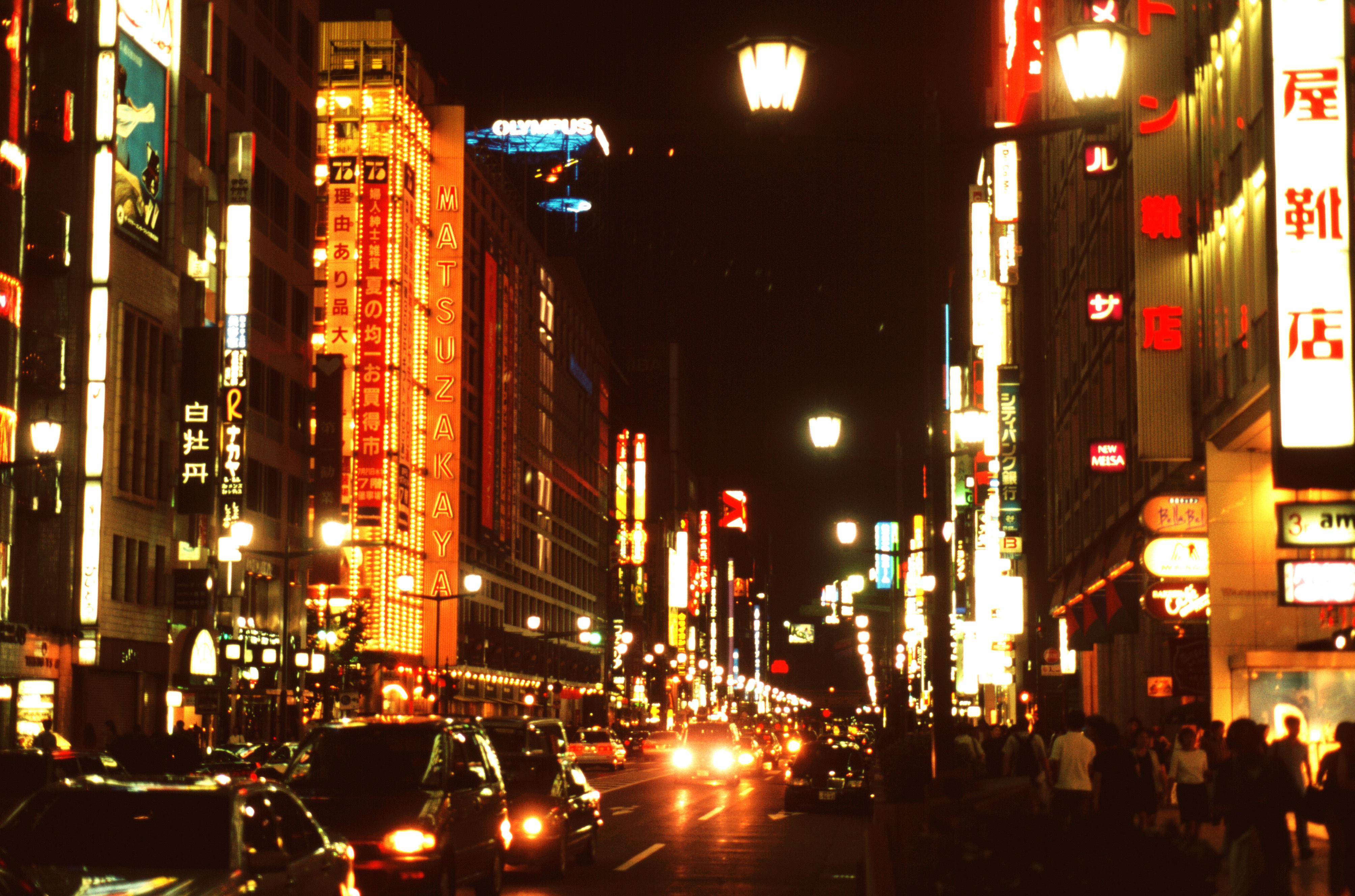 Japan, Tokyo, Traffic on busy Ginza street at night