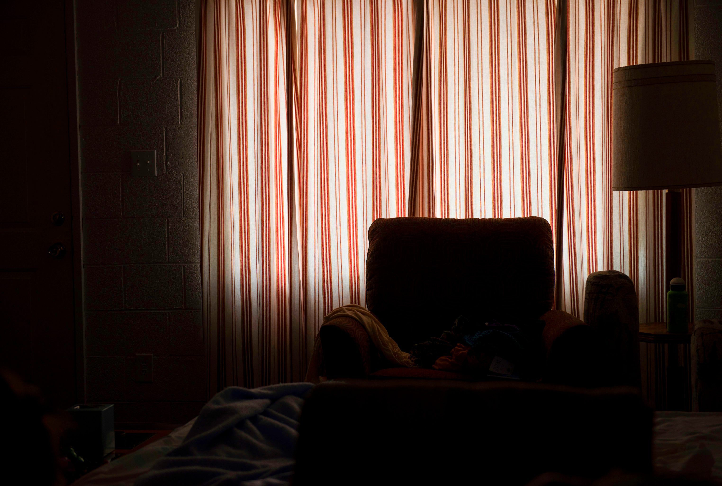 Armchair By Window At Home