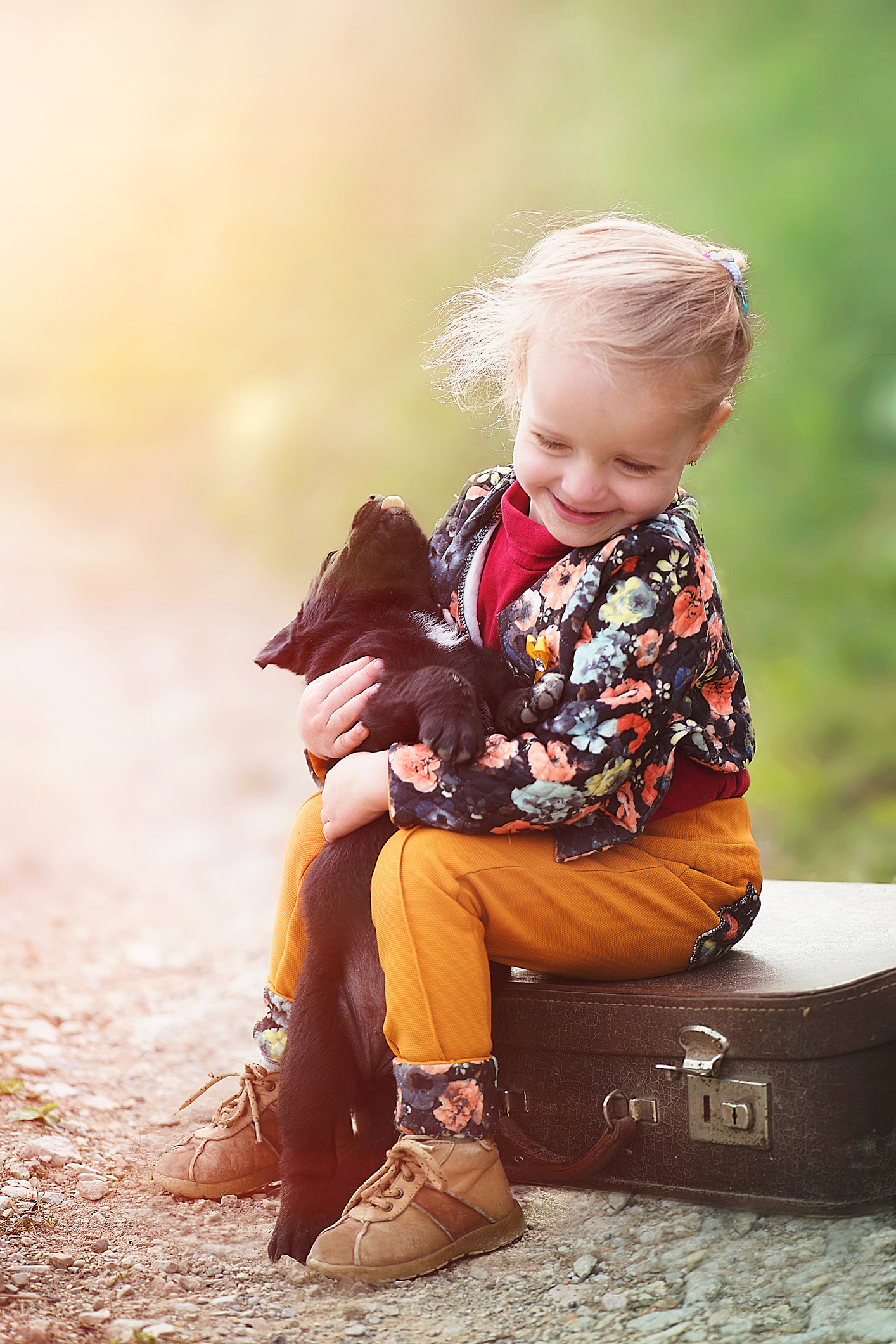 Girl Playing with Puppy