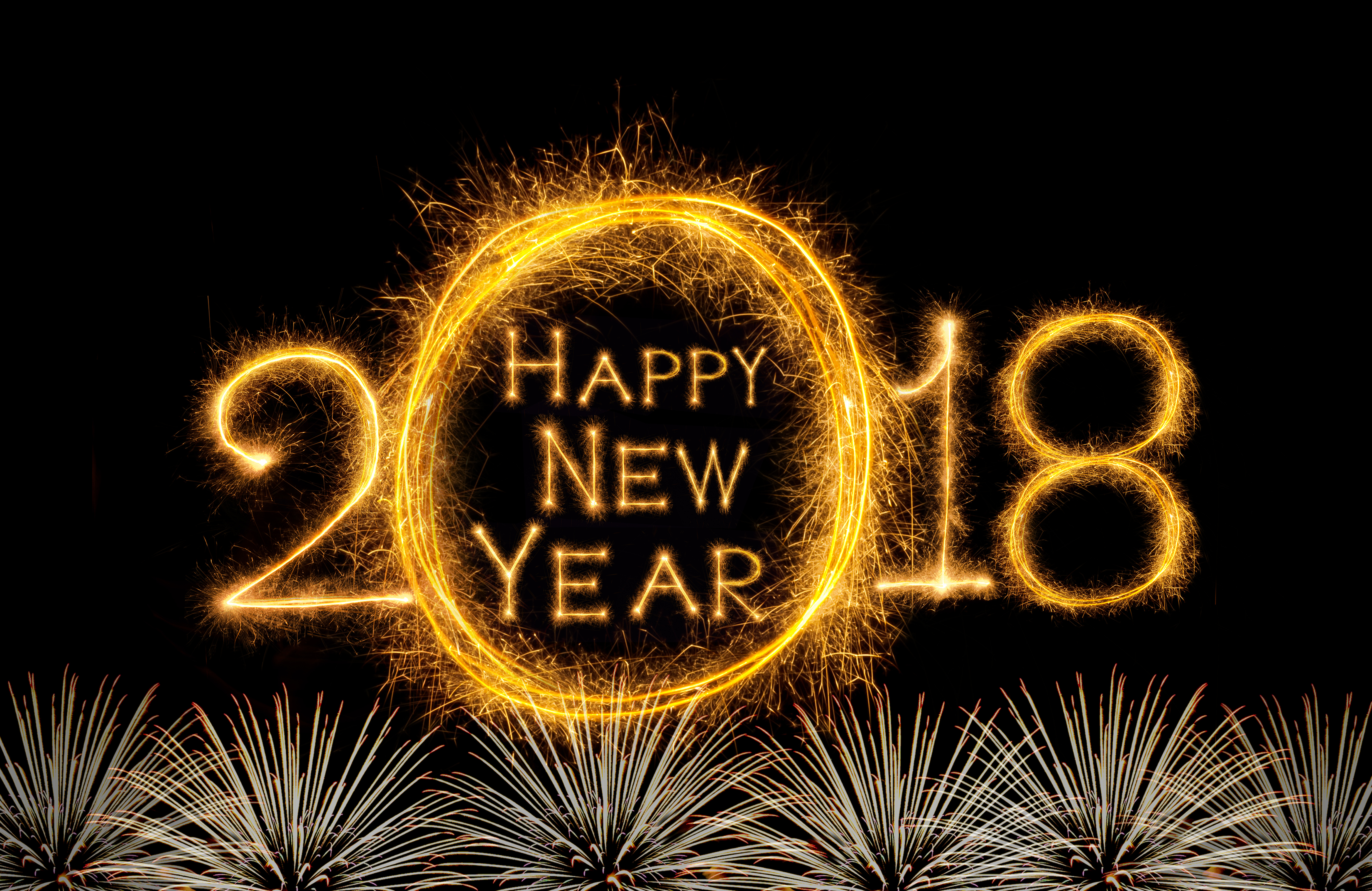 celebration and greeting cards concept, Happy new year 2018 written with Sparkle firework on fireworks with dark background