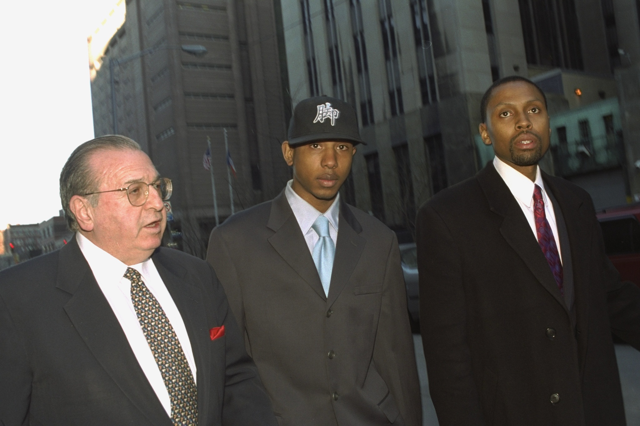 Jamal (Shyne) Barrow (center), rap protege of Sean (Puffy) C