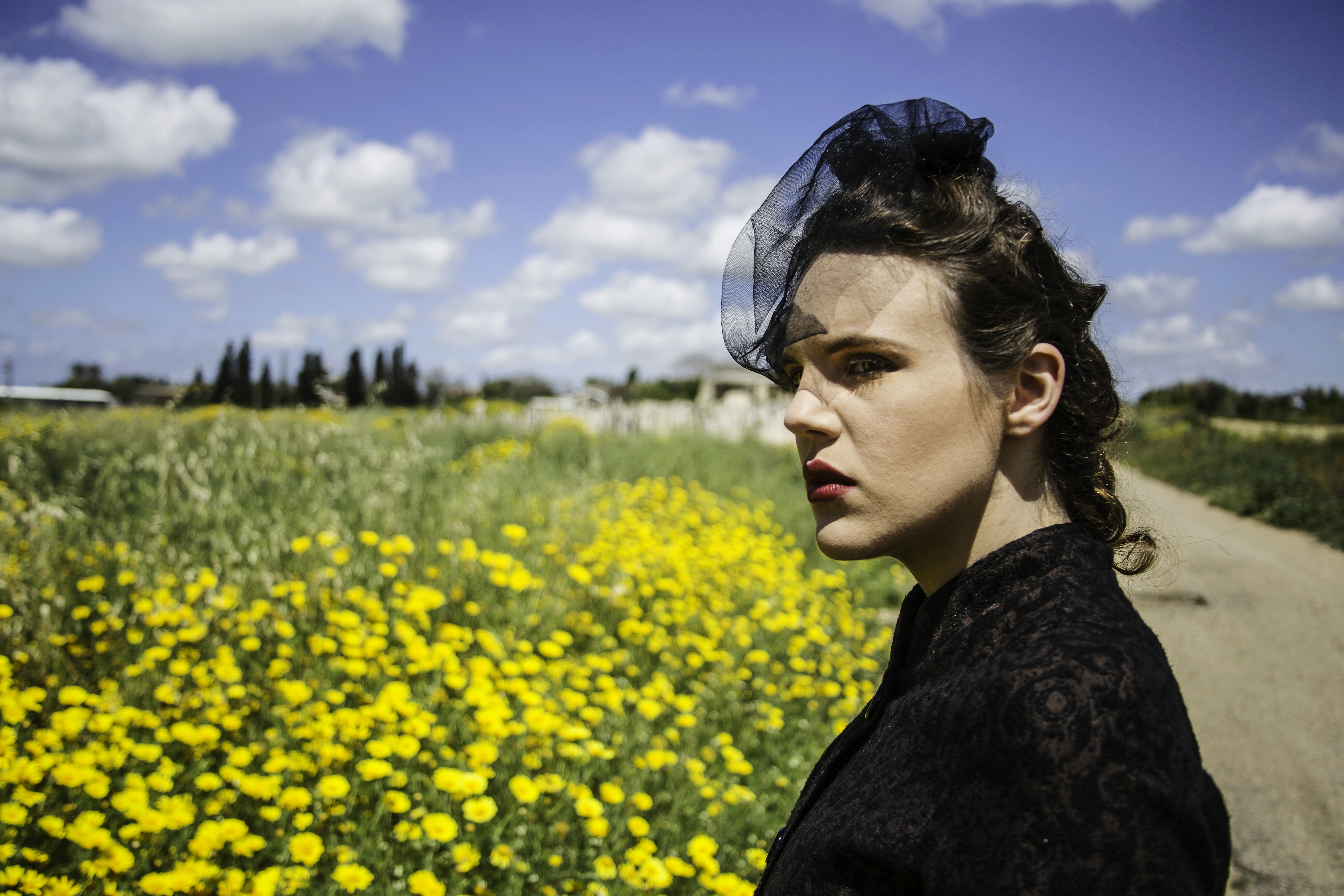 Side View Of Pretty Woman Looking Away