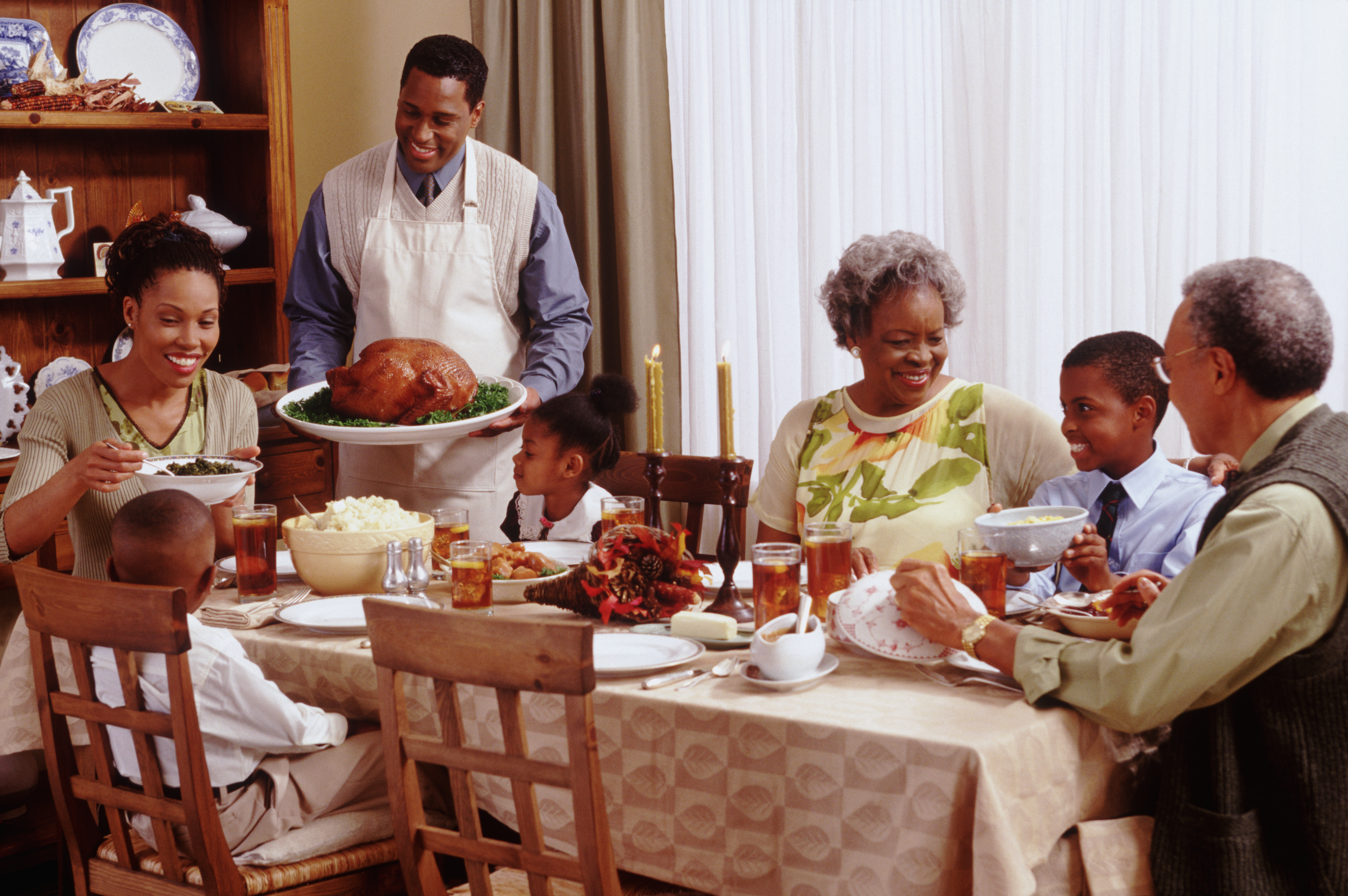 Family Enjoying Thanksgiving Dinner