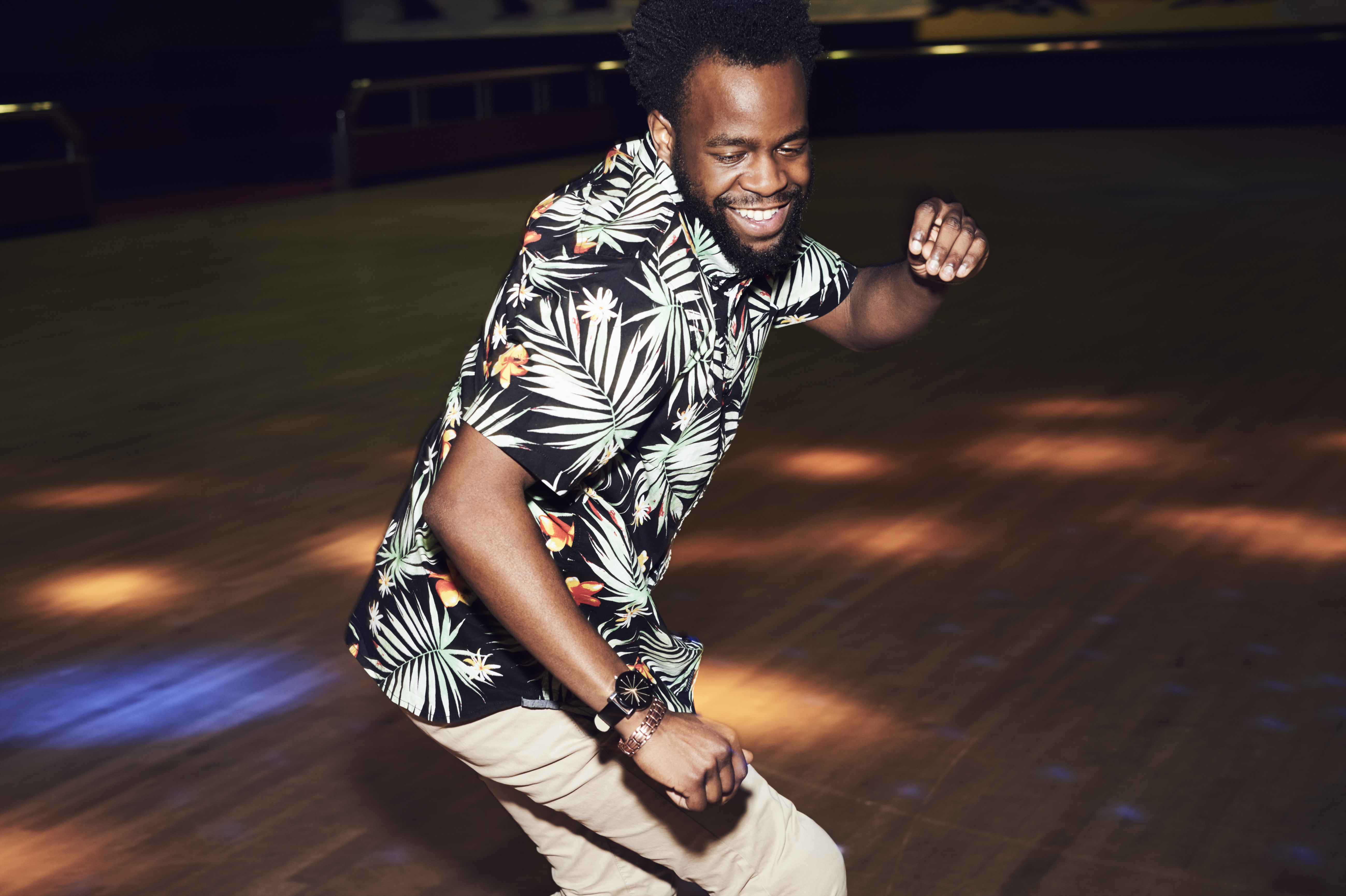 Man having fun at roller disco