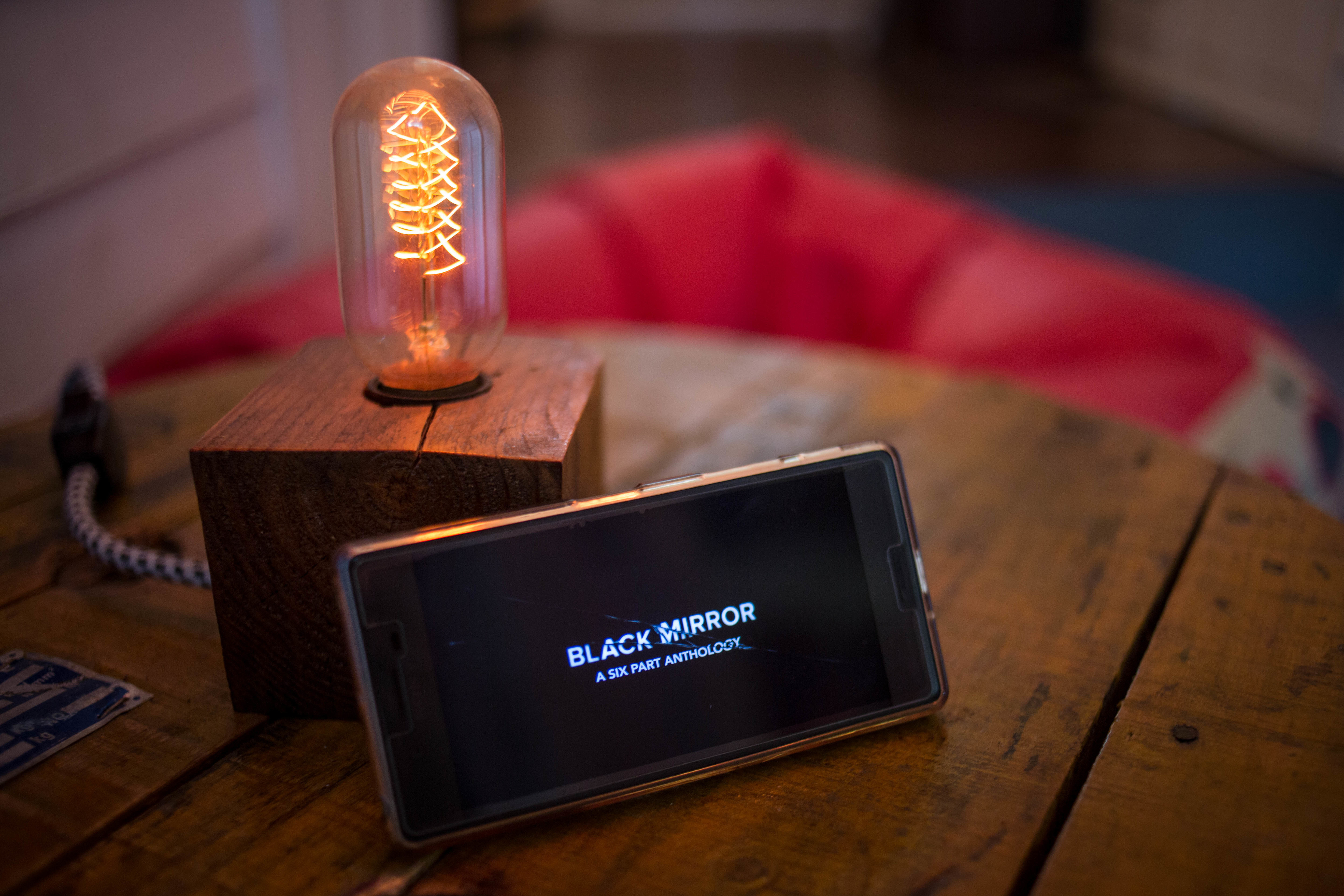 The logo 'Black Mirror' from the Netflix TV serie seen...