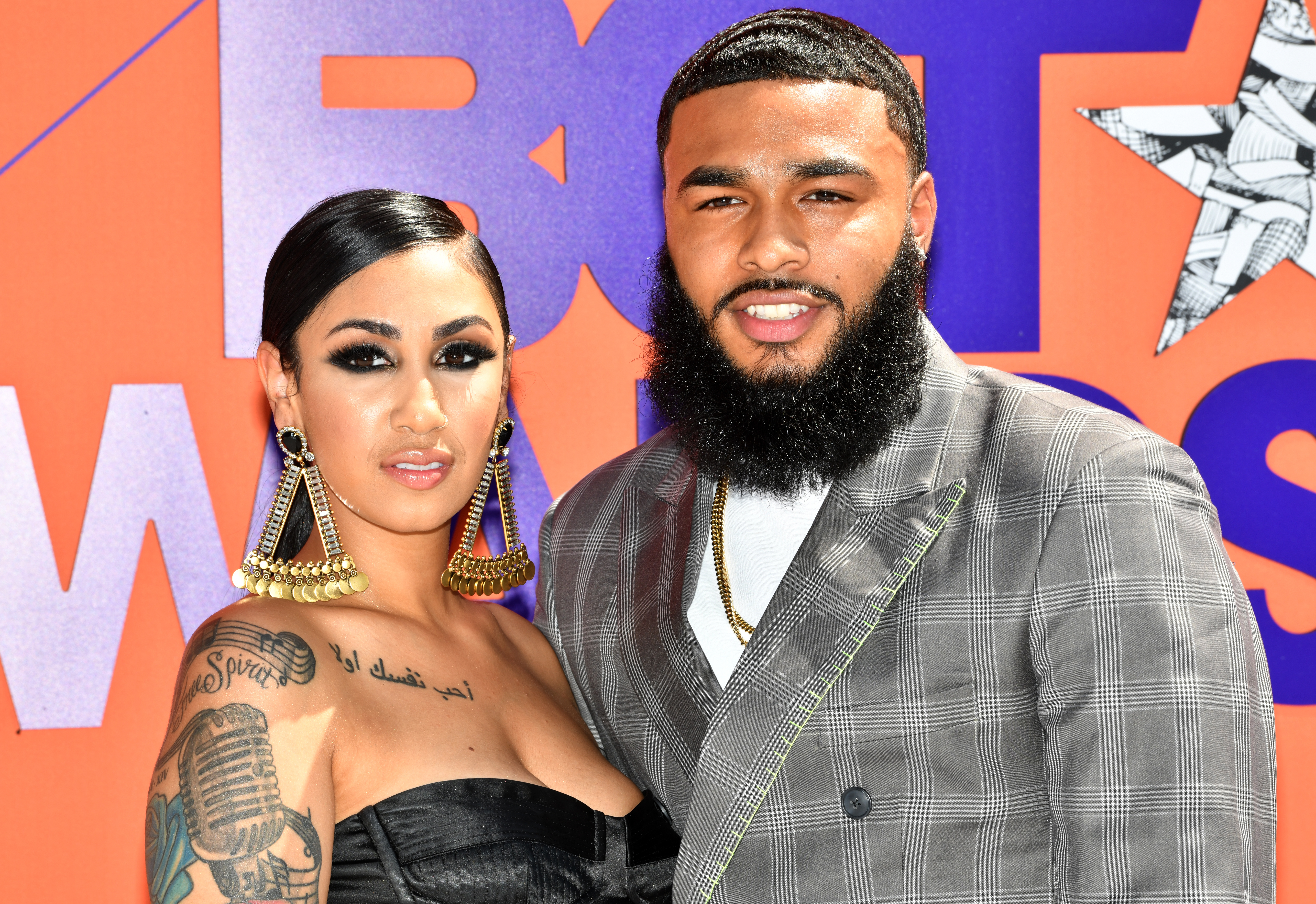 Queen Naija and Clarence White at 2018 BET Awards