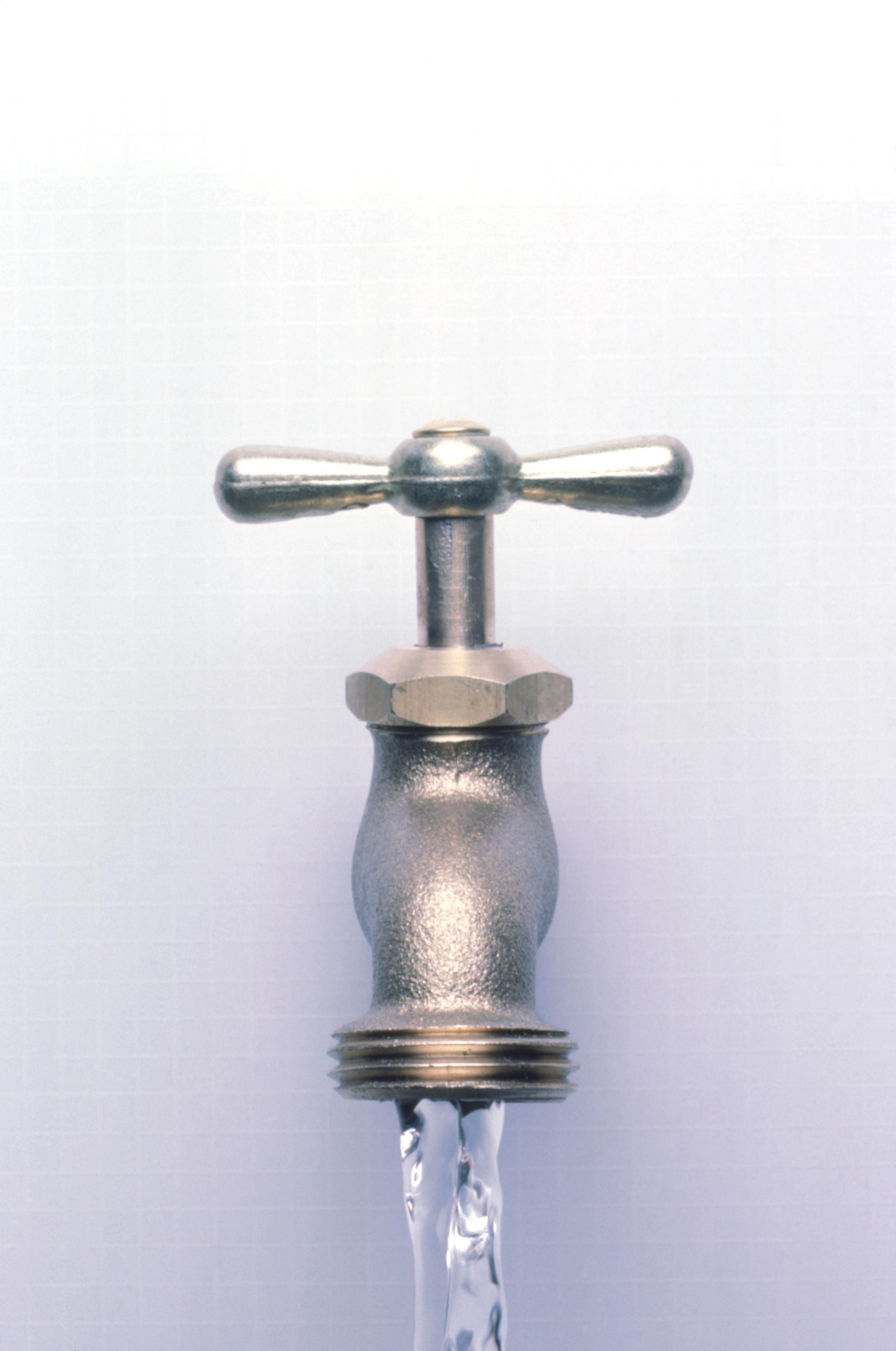 water coming out of a faucet