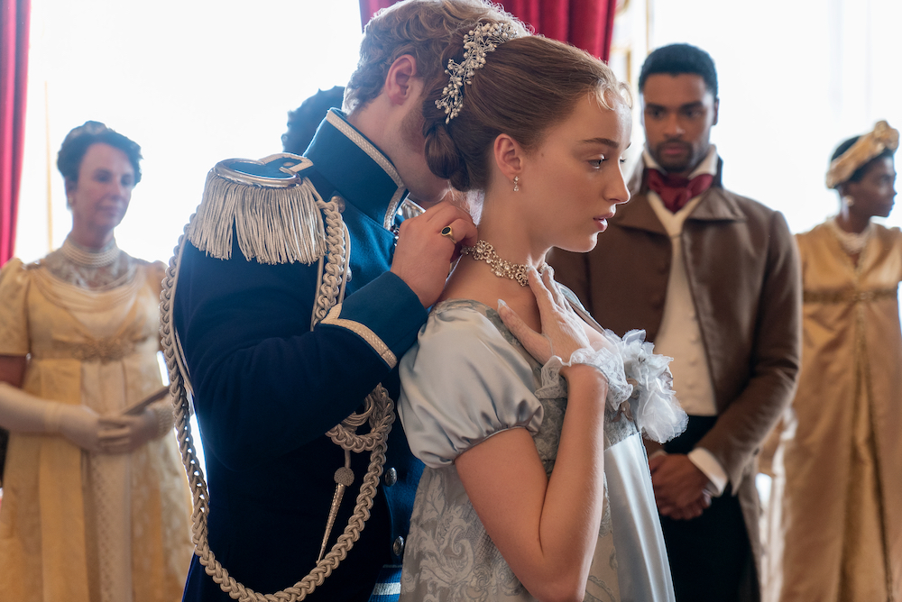 Regé-Jean Page, Phoebe Dynevor, and Freddie Stroma in 'Bridgerton.'