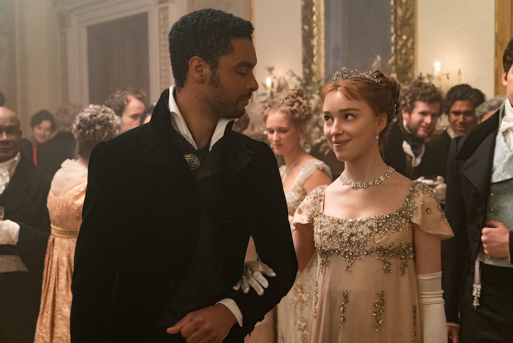 Regé-Jean Page & Phoebe Dynevor together in 'Bridgerton.'