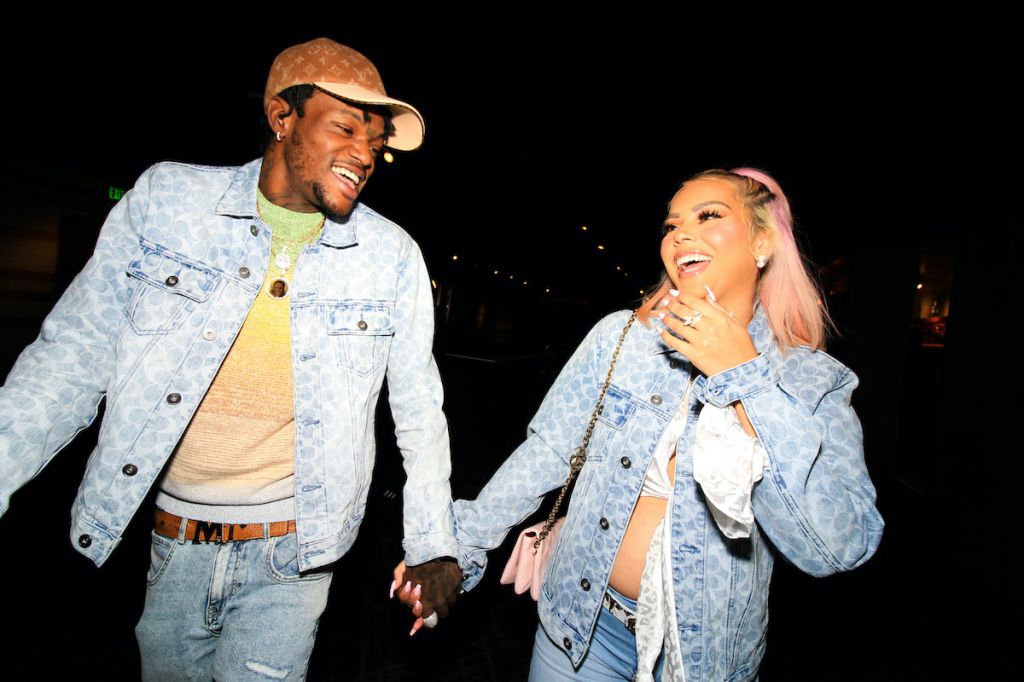 DC Young Fly and Ms Jacky Oh attend screening for Uncharted at iPic Theater in Colony Square