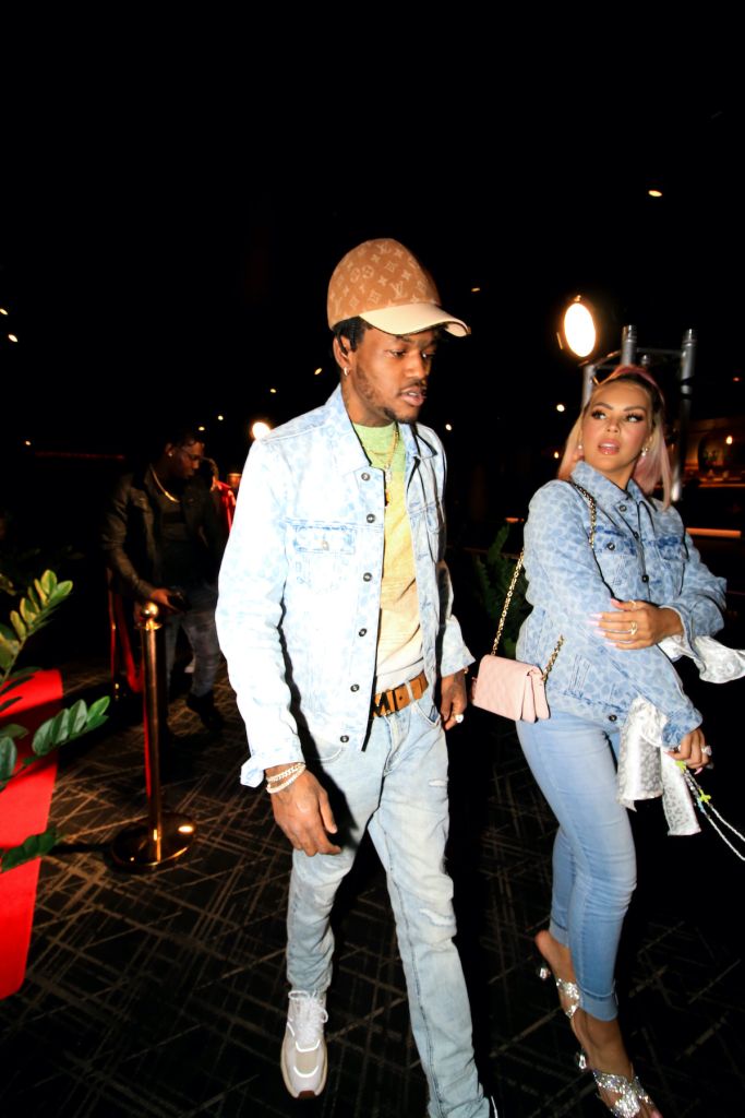 DC Young Fly and Ms Jacky Oh attend screening for Uncharted at iPic Theater in Colony Square