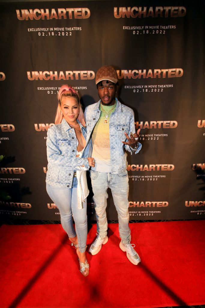 DC Young Fly and Ms Jacky Oh attend screening for Uncharted at iPic Theater in Colony Square