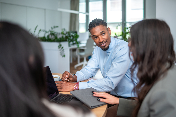 Diverse Business Team Engages in Strategy Session